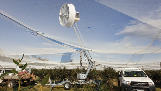 3.-Fans-can-be-used-under-netting-to-protect-crops,-fan-is-positioned-under-nets-and-then-boom-is-raised.