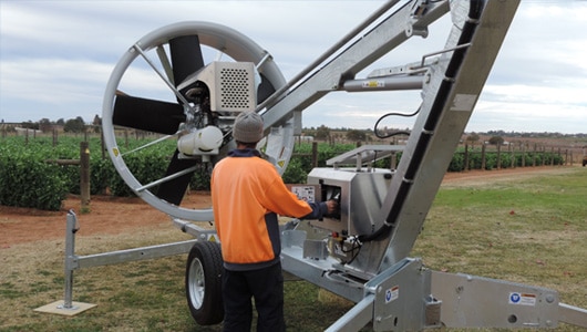 6.-Fully-adjustable-boom-height-allows-fan-to-be-used-to-protect-a-variety-of-crops-(Snow-peas-pictured)